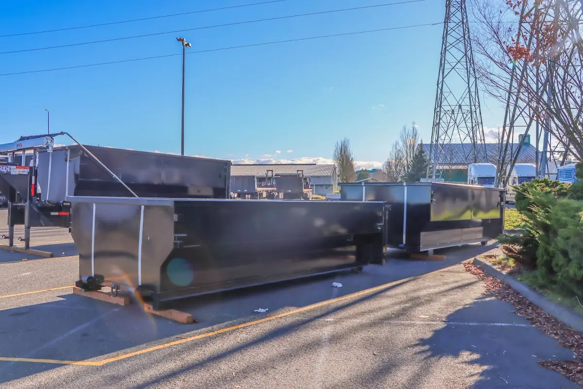 Roll-off dumpster ready for waste disposal at job site for 2 Yard Dumpster Rental in Bartlett